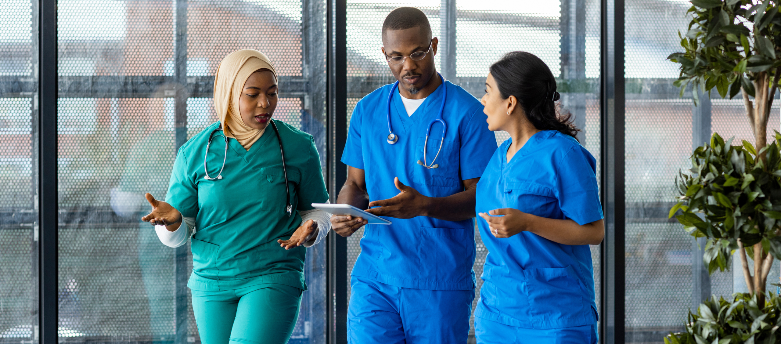 Group of doctors walking in hospital